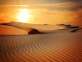 日落夕阳下的沙漠场景高清图片下载